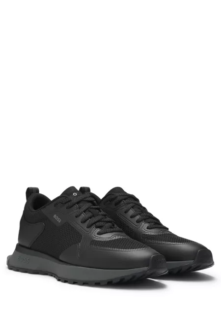 Mixed-material trainers with mesh details and branding