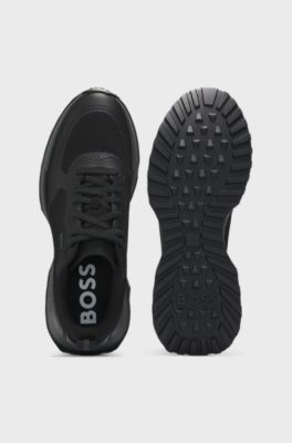 Mixed-material trainers with mesh details and branding, Black