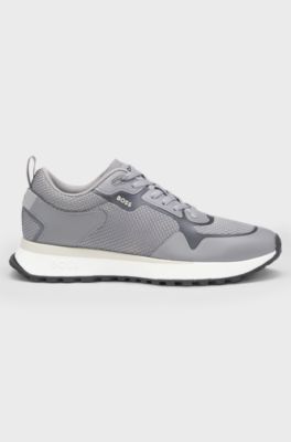 Mixed-material trainers with mesh details and branding, Grey