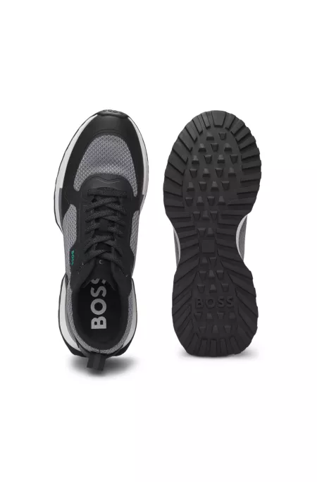 Mixed-material trainers with mesh details and branding