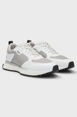 Mixed-material trainers with mesh details and branding, Natural