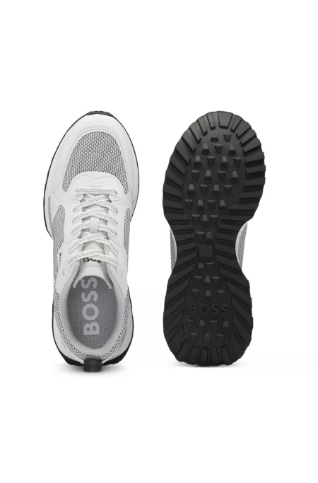 Mixed-material trainers with mesh details and branding