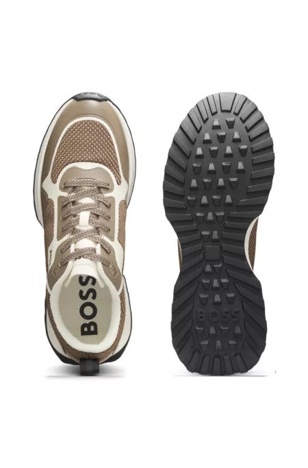 Mixed-material trainers with mesh details and branding
