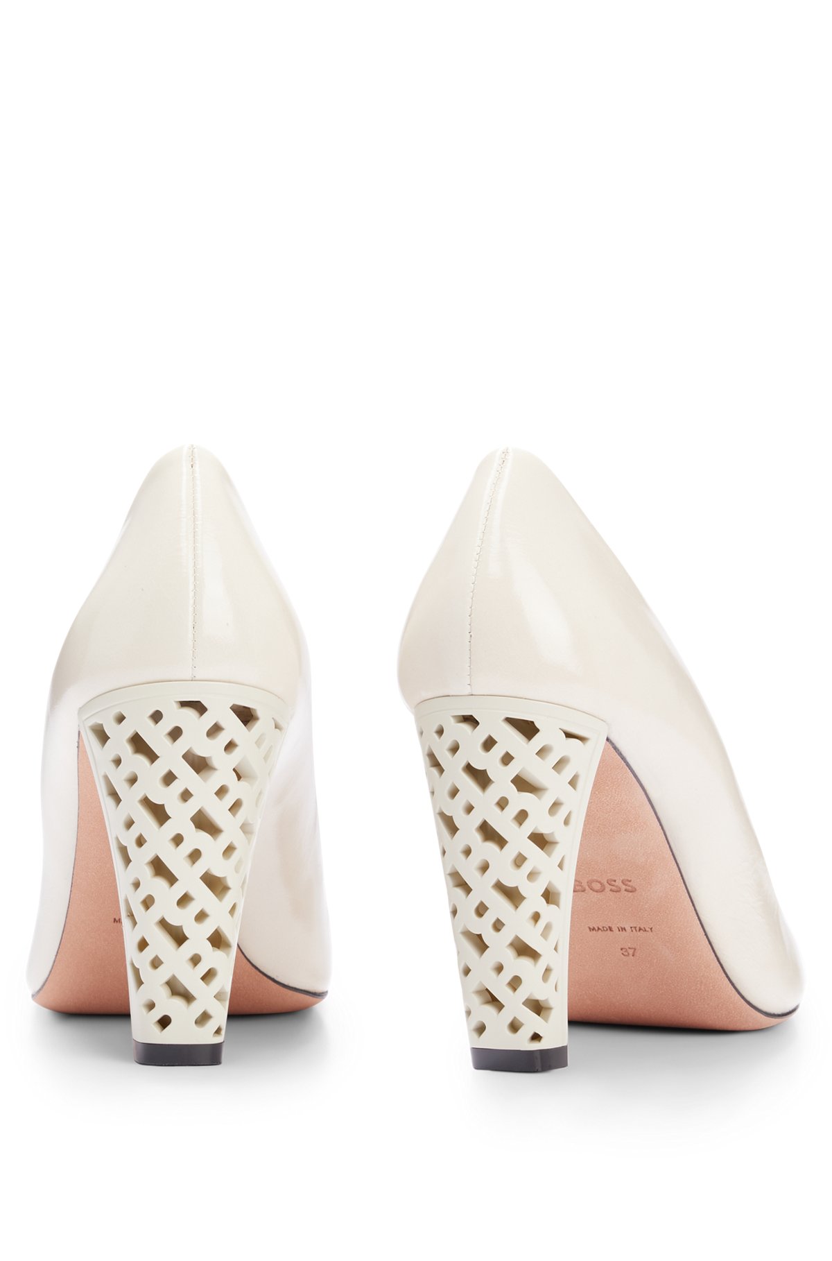 Leather pumps with monogram-patterned heels, White