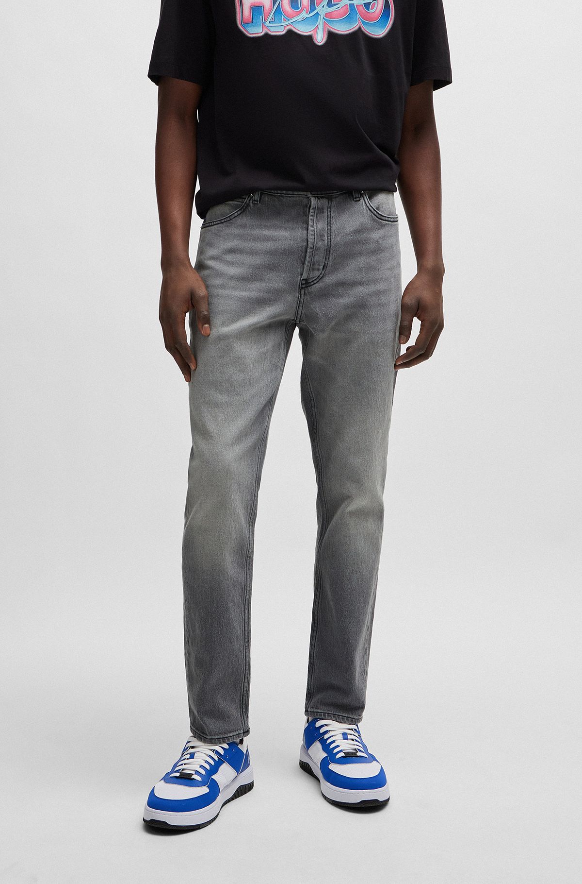 Jeans con fit affusolato in denim elasticizzato grigio, Grigio