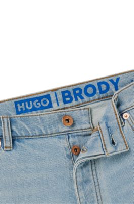 HUGO - Tapered-fit jeans in light-blue stretch denim