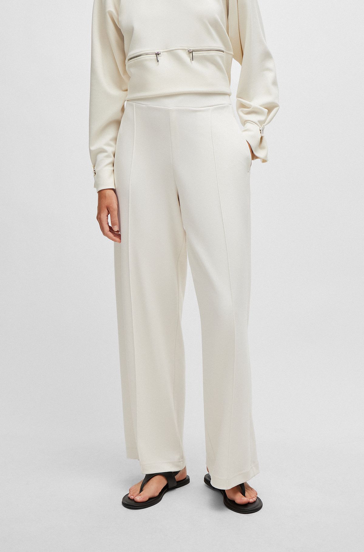 Piqué jersey trousers with front pleats, White