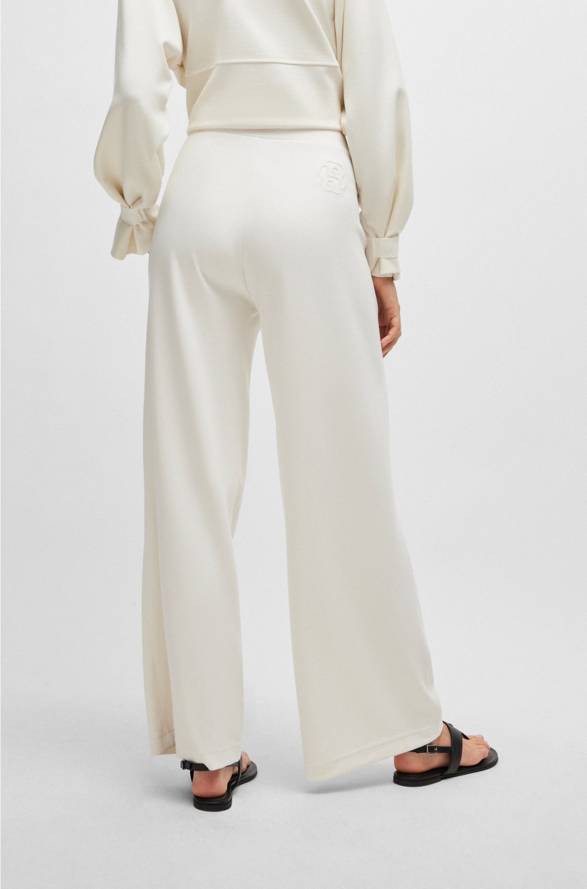 Piqué jersey trousers with front pleats, White