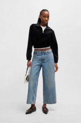 Slim-fit sleeveless top with irregular ribbed structure, White