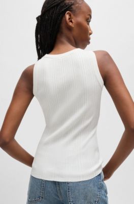 Slim-fit sleeveless top with irregular ribbed structure, White