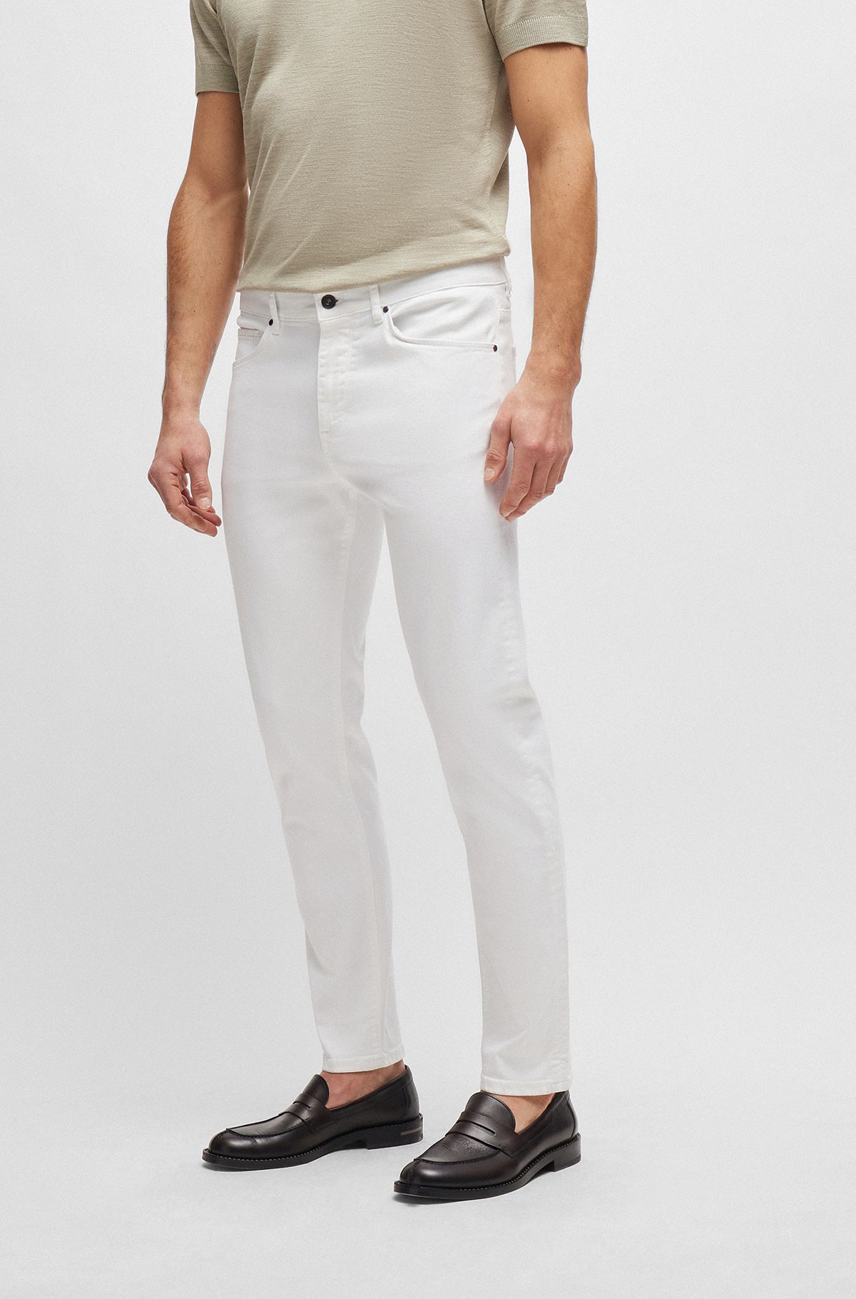 Jeans con fit affusolato in denim elasticizzato bianco italiano, Bianco
