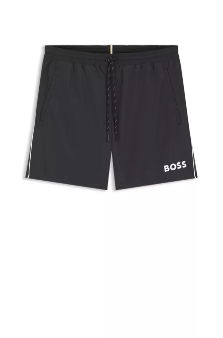 Bañador tipo shorts con logo y ribetes en contraste