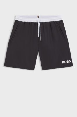 Badeshorts mit kontrastfarbenem Logo und Paspelierung, Dunkelgrau
