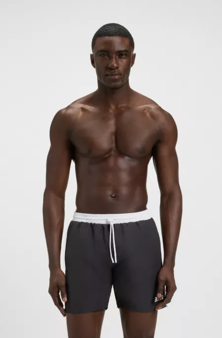 Swim shorts with contrast logo