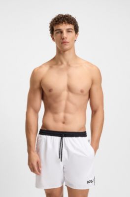 Swim shorts with contrast logo and piping, White