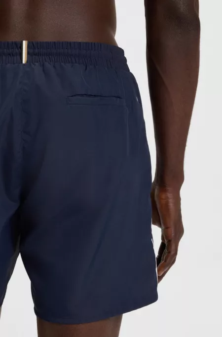 Swim shorts with contrast logo