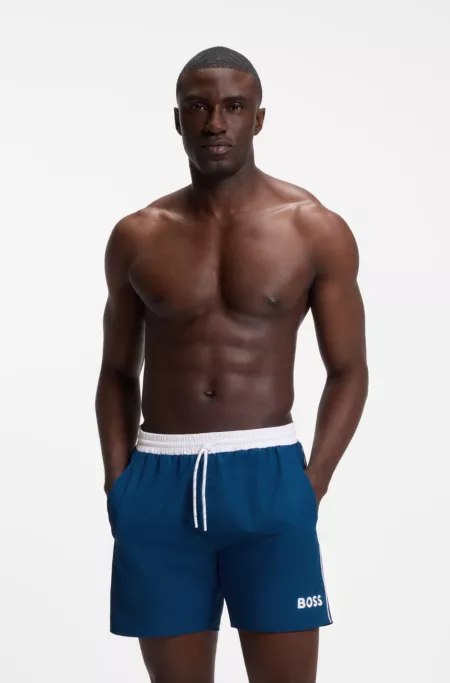 Medium-length swim shorts with contrast details