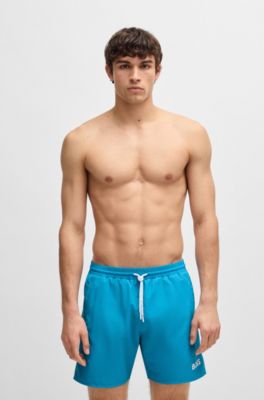 Badshorts med kontrastlogga och kantband, Turkos