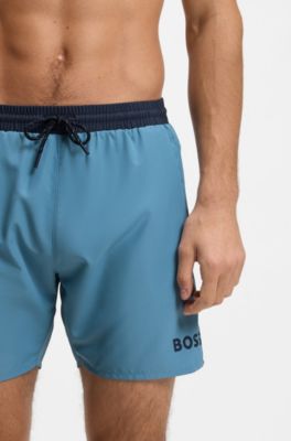 Quick-dry swim shorts with logo print, Turquoise