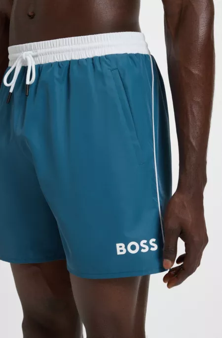 Swim shorts with contrast logo