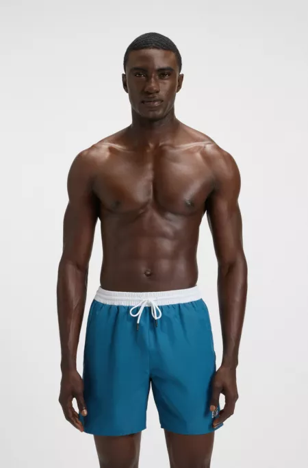 Swim shorts with contrast logo