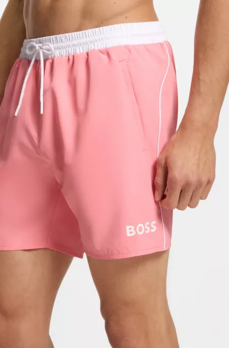 Swim shorts with contrast logo and piping