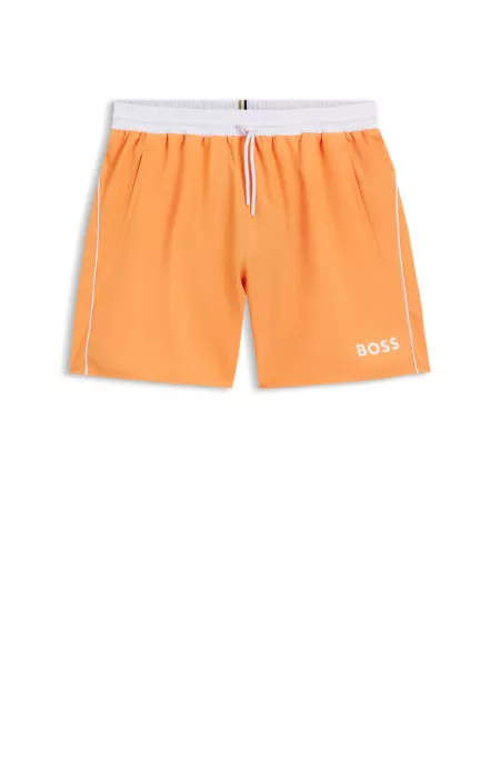 Bañador tipo shorts con logo y ribetes en contraste