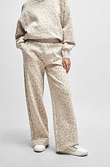 NAOMI x BOSS cotton-blend tracksuit bottoms with leopard print, Beige Patterned