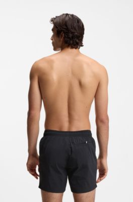 Schnell trocknende Badeshorts mit vertikalem Logo-Print, Schwarz