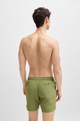 Schnell trocknende Badeshorts mit vertikalem Logo-Print, Gr&uuml;n