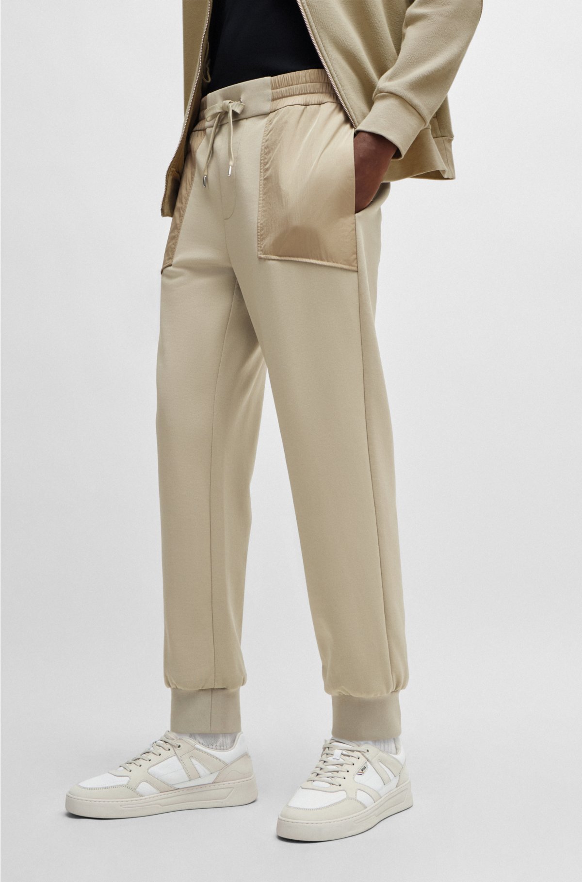 Cotton-blend tracksuit bottoms with contrast-fabric trims, Beige