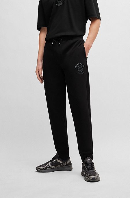 Спортивные брюки BOSS x NFL с принтом с эффектом металлик, Черный
