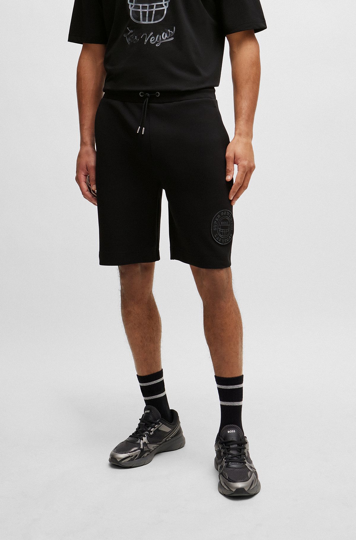 BOSS x NFL-shorts i bomuldsblanding med brandet lap, Sort