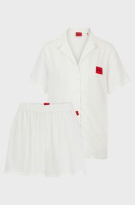 Regular-fit pyjamas with red logo labels, White