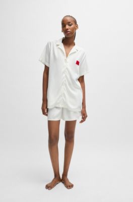 Regular-fit pyjamas with red logo labels, White