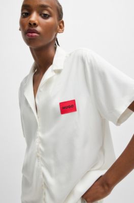 Regular-fit pyjamas with red logo labels, White