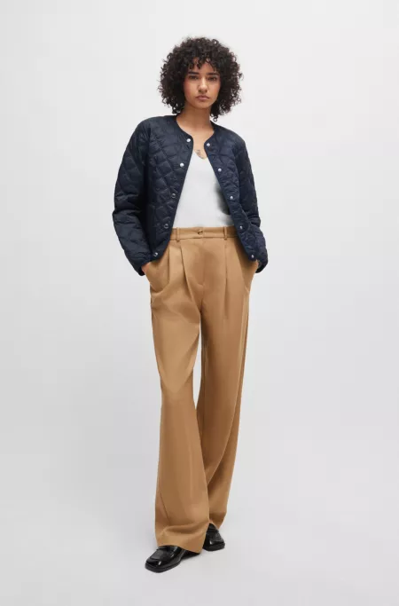 Water-repellent jacket with diamond quilting and branded poppers