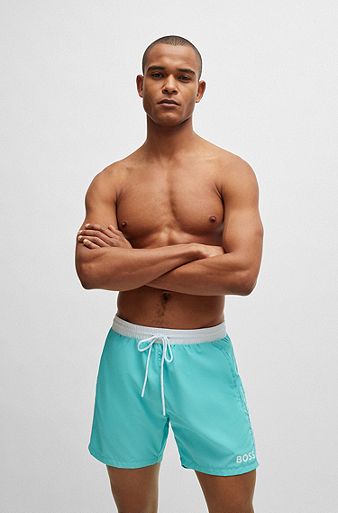 Quick-dry swim shorts with logo print, Turquoise