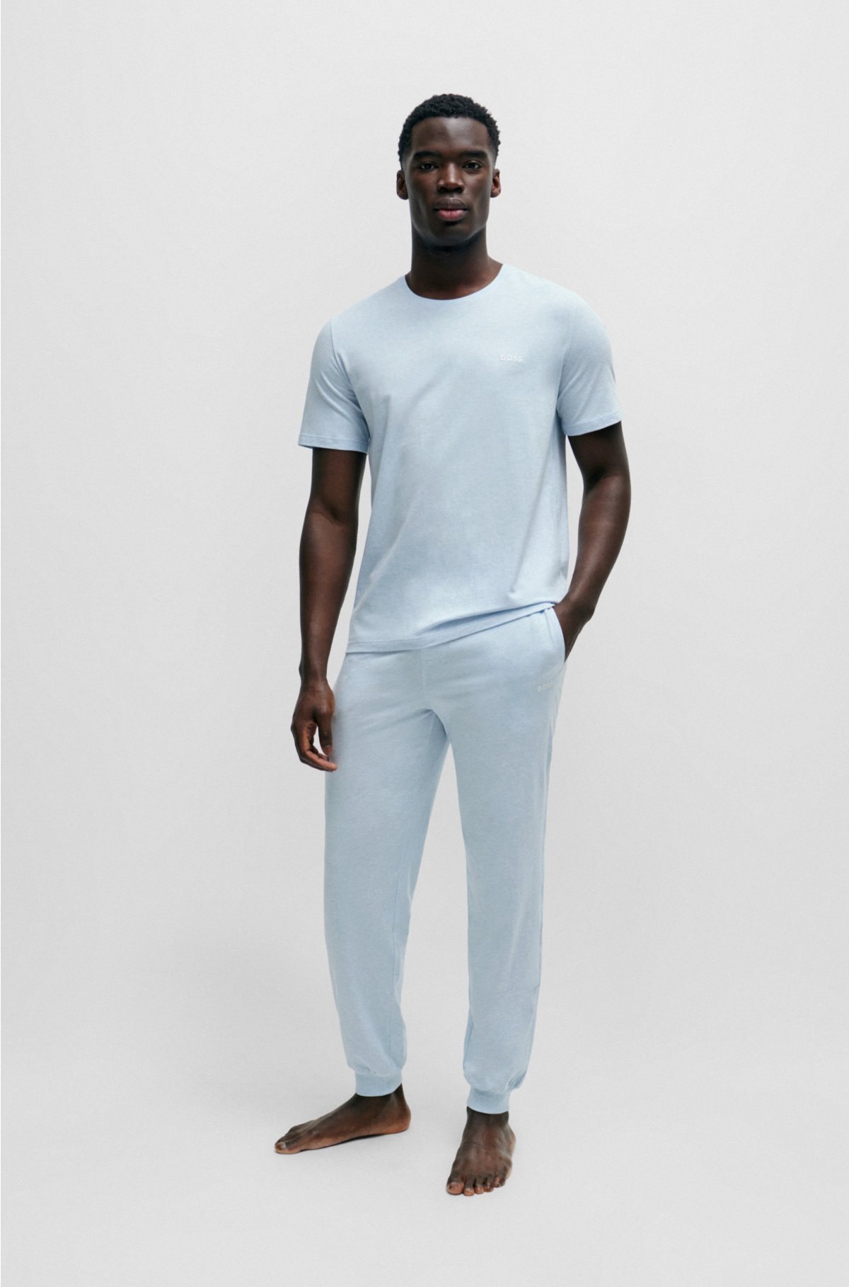 Logo-embroidered tracksuit bottoms in stretch-cotton jersey, Light Blue