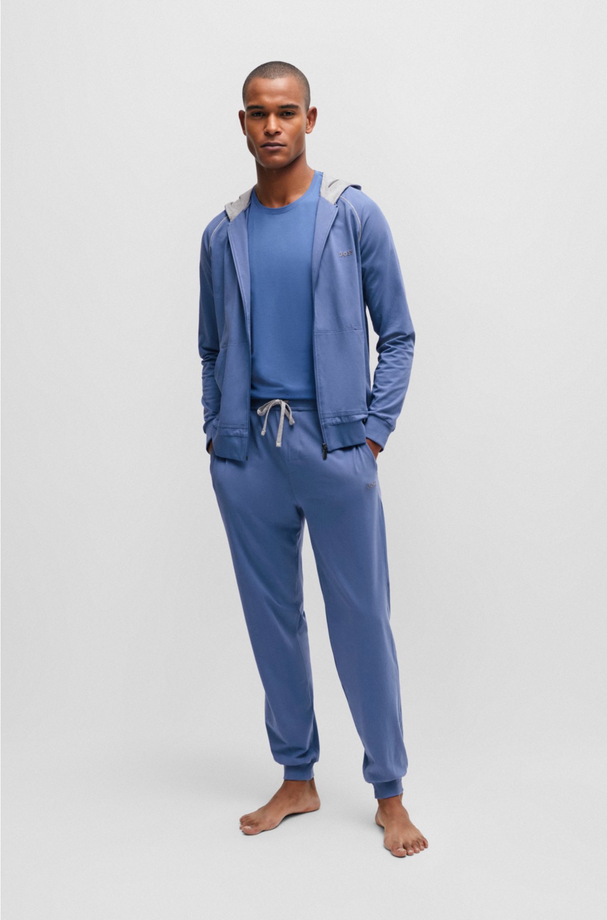 Logo-embroidered tracksuit bottoms in stretch-cotton jersey, Blue
