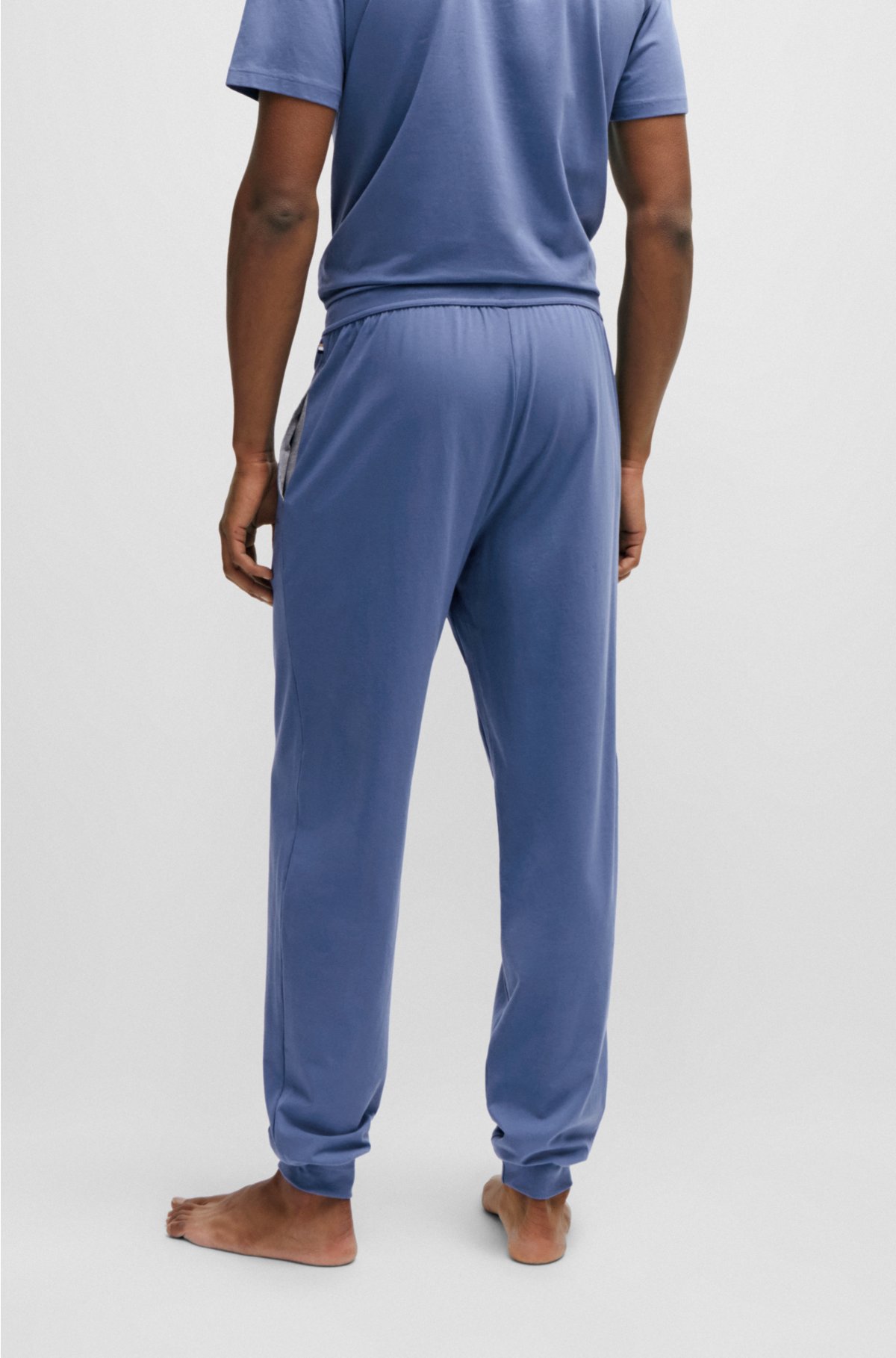Logo-embroidered tracksuit bottoms in stretch-cotton jersey, Blue