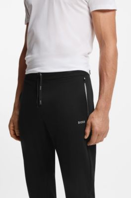 Bas de surv&ecirc;tement en coton stretch &agrave; logo brod&eacute;, Noir