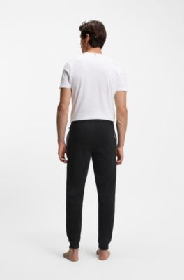 Bas de surv&ecirc;tement en coton stretch &agrave; logo brod&eacute;, Noir