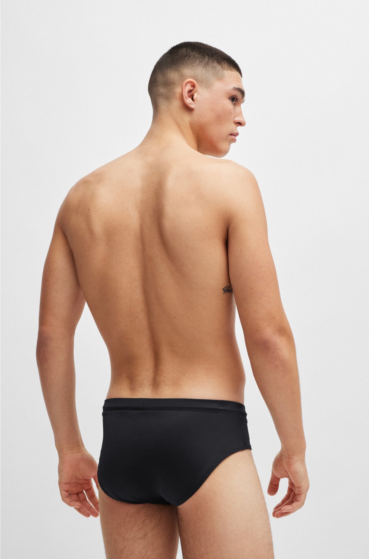 Stretch-jersey swim briefs with foil-print logo, Black