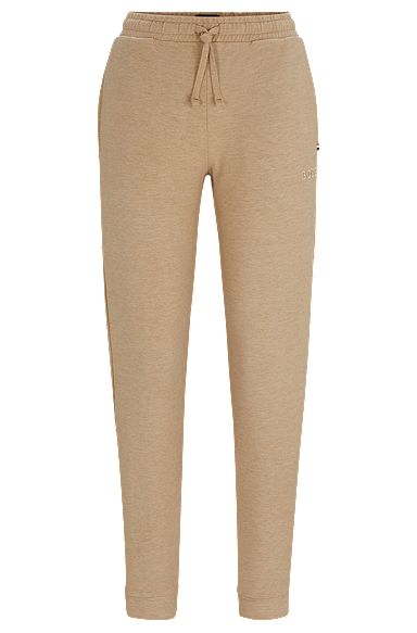 Cuffed tracksuit bottoms in French terry with logo detail, Beige