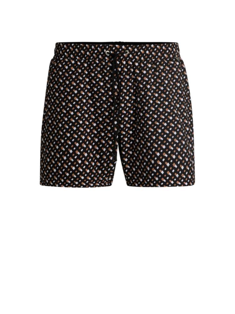 Artikel klicken und genauer betrachten! - BOSS Badeshorts aus einem schnell trocknenden Gewebe mit durchgehendem Innenfutter, Signature-Details und Allover-Monogrammen, die für einen markanten Look sorgen.Das Produkt wird teilweise aus recyceltem Polyester gefertigt. Wir bei HUGO BOSS bevorzugen recycelten Polyester aus Materialabfällen und gebrauchten Stoffresten und geben unser Bestes, um von Polyester aus PET-Flaschen umzusteigen. | im Online Shop kaufen