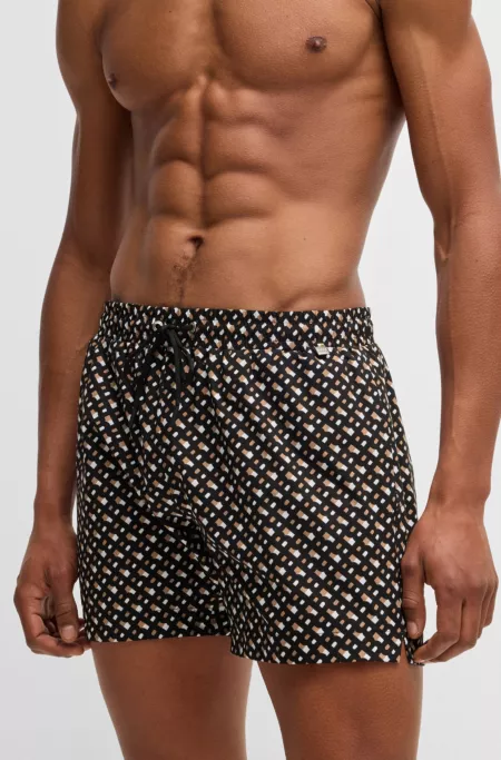 Fully lined quick-dry swim shorts with monogram print