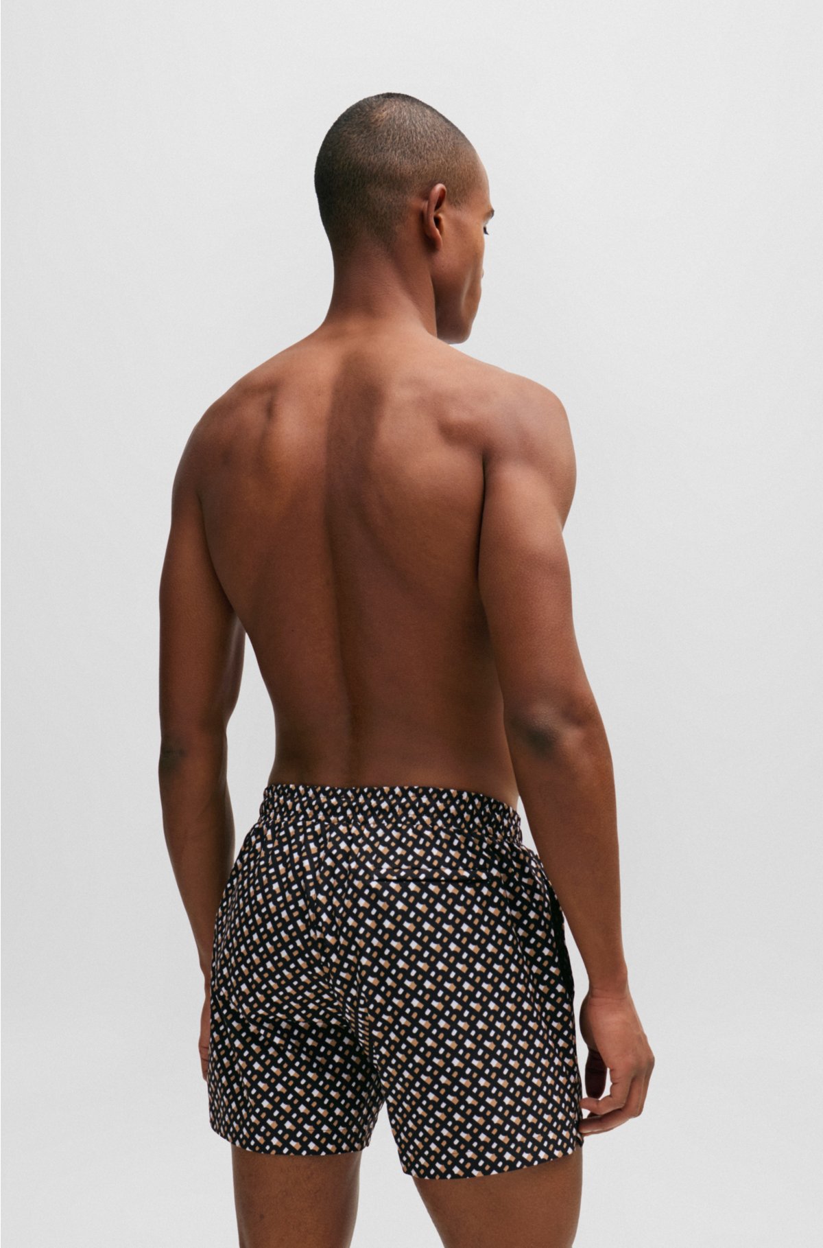 Fully lined quick-dry swim shorts with monogram print, Patterned