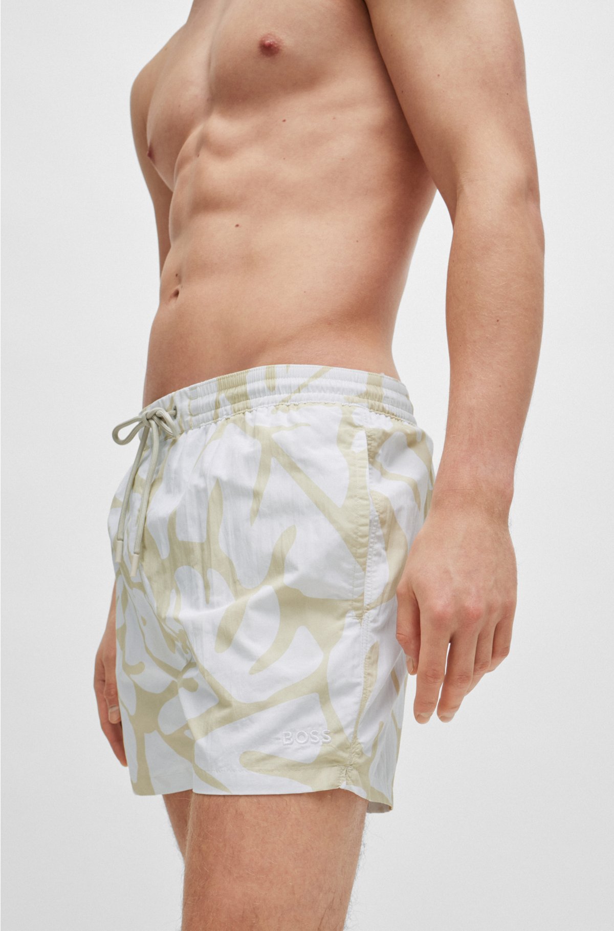 Quick-dry swim shorts with seasonal pattern, Light Beige