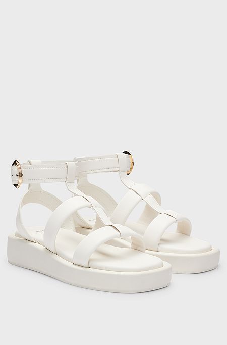 Platform leather sandals with branded buckle closure, White